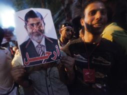 Los arrestos se producen horas después del derrocamiento de Mursi, también acusado en el caso. AFP /