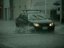 La lluvia dejó a su paso encharcamientos y algunas zonas intransitables.  /