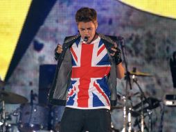 A Elton John no le gustaría estar en los zapatos de Justin Bieber. ARCHIVO /