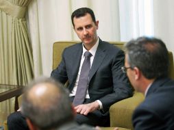 Al assad dice que el país ha podido evitar convertirse en un Estado fallido gracias a que la industria continúa haciendo su trabajo. AP /