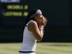 Bartoli tuvo la suerte de no encontrarse con ninguna de las diez primeras tenistas del ranking. EFE /