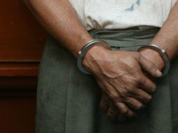 En una mochila llevaba una pistola colt calibre.45 tipo escuadra, con ocho balas y dos cargadores. ARCHIVO /