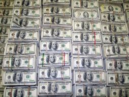 Se prevé que el año presupuestario 2013 será el primero con Obama en que el déficit no excederá un billón de dólares. ARCHIVO /