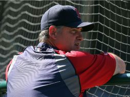 John Farrell, entrenador de lanzadores, ha sido clave en el éxito de los Medias Rojas. AFP /