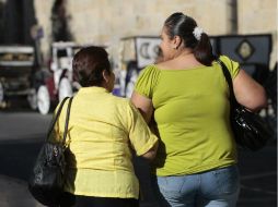 Activistas advierten cómo el mayor consumo de comida procesada contribuye a la obesidad. ARCHIVO /
