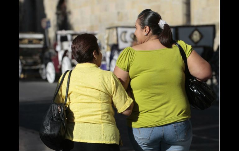 Activistas advierten cómo el mayor consumo de comida procesada contribuye a la obesidad. ARCHIVO /