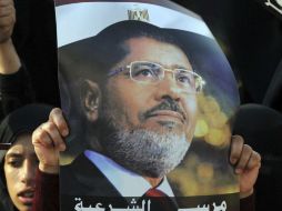 Una simpatizante del depuesto presidente Mohamed Mursi protesta durante una manifestación. ARCHIVO /