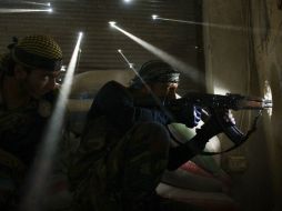 La Coalición Nacional Siria asegura que no llegarána a manos de rebeldes las armas proporcionadas. ARCHIVO /