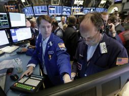 El selectivo S&P 500 termina en los mil 680.19 enteros, también con récord histórico. AP /