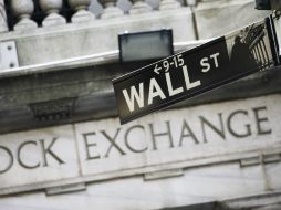 Wall Street cierra hoy con pérdidas presionado por los resultados de Coca-Cola. AP /