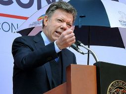 Juan Manuel Santos ofrece la mano generosa de la sociedad a los ex guerrilleros. EFE /