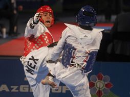 Uriel Adriano (izq) saco a flote al equipo mexicano de taekwondo este día en el Mundial. NTX /