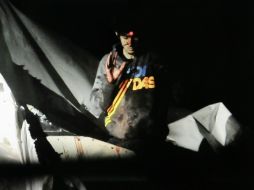 Suspenden a policía que difundió fotos de Tsarnaev. En una de las imágenes, se ve el láser de un francotirador en su frente. AP /