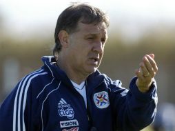 El estratega es conocido por algunos de los jugadores del Barsa, como Lio Messi. ARCHIVO /