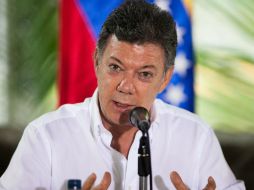 Juan Manuel Santos indicó que la relación positiva que tuvo con Chávez es la que va a tener con Maduro. AFP /