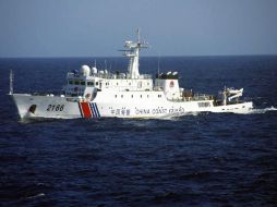 En la vida real, guardacostas japoneses fotografiaron este mismo día un guardacostas chino patrullando Senkaku. AFP /