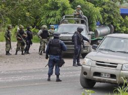 Las acciones de los soldados son para evitar que los posibles agresores de elementos de la Policía Federal traten de ingresar a Jalisco SUN /