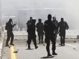 En diciembre de 2011 se suscitó un desalojo por policías hacia estudiantes normalistas, con un saldo de dos alumnos muertos. ARCHIVO /
