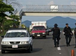 Los organizadores argumentan que  los caminos para llegar al municipio están prácticamente intransitables. AFP /