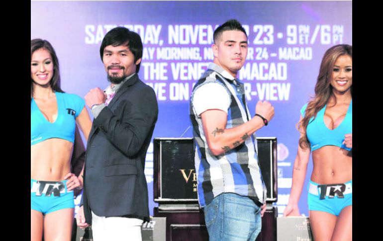 De vuelta. Manny Pacquiao (izq) busca ante Brandon Ríos ganarse también el mercado del público chino. AP /