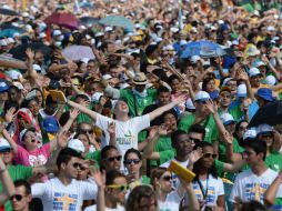 El carisma del Papa contagió a la mayoría de los presentes. AFP /