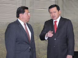 El secretario de Gobernación (d) y el gobernador interino de Michoacán encabezan la reunión. ARCHIVO /