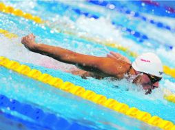 Ryan Lochte exclamó ''he sobrevivido'' tras ganar los 200 espalda, las semifinales de 100 mariposa y la final de relevos 4x200 libres. AFP /