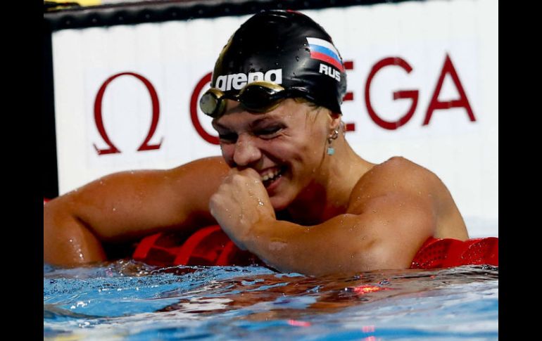 La nadadora de Rusia, Yuliya Efimova, feliz tras nadar la eliminatoria de los 50m braza femeninos. EFE /