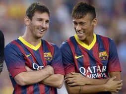 Messi y 'Ney' se embolsan 31 millones de euros entre ambos, cada año. AP /