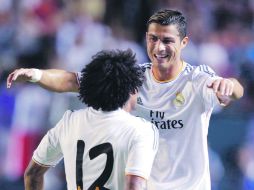 Marcelo y Ronaldo hicieron los goles del Real y festejaron volteando hacia la banca del Chelsea. AP /
