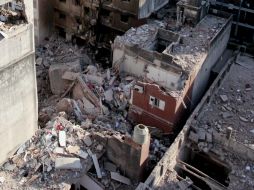 Bajo los escombros del edificio aún hay seis personas desaparecidas. ARCHIVO /