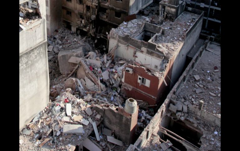 Bajo los escombros del edificio aún hay seis personas desaparecidas. ARCHIVO /