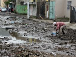 Las calles de la colonia Lomas de la Primavera se convirtieron en auténticos ríos de lodo. EL INFORMADOR /