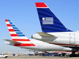 El Departamento de Justicia de EU presenta una demanda contra la fusión entre las aerolíneas American Airlines y US Airways. EFE /