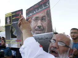 Un grupo de jordanos protestan durante una manifestación contra el ministro de Defensa y jefe de las Fuerzas Armadas. EFE /
