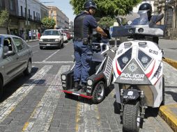 Según inspector, por turno son 600 oficiales los que patrullan la ciudad. ARCHIVO /