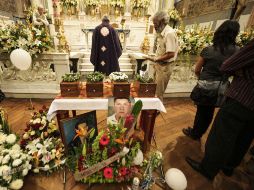 Hoy se celebró una misa con los cuatro cofres que la Fiscalía General del Estado entregó a los familiares de los jóvenes.  /