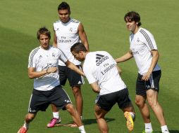 Coentrao, Casemiro, Ronaldo y Kaká (I-D), preparandosee para el partido en Valdebebas. EFE /