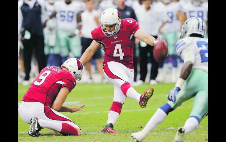Efectivo. Jay Feely conecta uno de sus cuatro goles de campo AP /