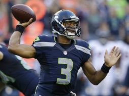 Wilson lanza dos pases de anotación para la victoria de su equipo. AP /