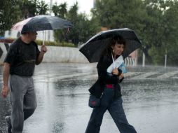 El sinaproc alerta al sur y centro del país por el remanente de la Onda Tropical ''13'' que provocará fuertes lluvias. ARCHIVO /