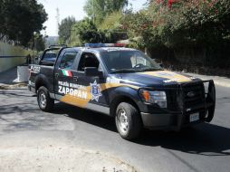 Dentro de la casa, policías aseguraron cinco pistolas y dos fusiles de asalto. ARCHIVO /