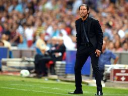 Diego Simeone dijo que el primer tiempo de su equipo fue impresionante, cerca de las mejores finales. AFP /