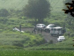 La PGR informa que encontraron un total de 13 personas en la fosa clandestina de Tlalmanalco. EFE /