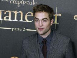 Robert Pattinson afirma que le gustaría saber qué hacen los fans de la saga durante el día entero. ARCHIVO /