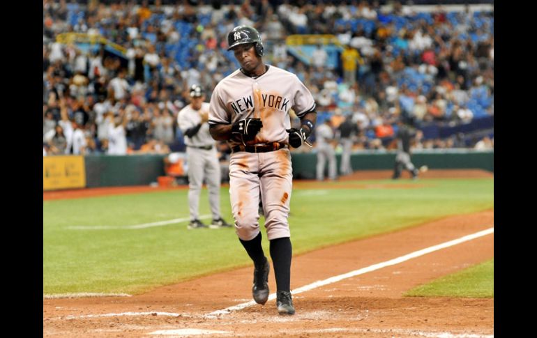 Alfonso Soriano anota una de las carrera de los Bombarderos dle Bronx en el partido. AFP /