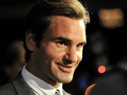 Roger Federer no pudo debutar hoy debido a que una intensa lluvia comenzó a caer. ARCHIVO /