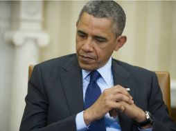 Barack Obama se ve favorecido a ordenar un bombardeo ya que el Congreso se encuentra en receso. ARCHIVO /