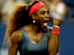 Serena Williams logra terminar su partido antes de que la lluvia hiciera su aparición. AFP /