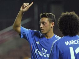 Mesut asegura sentirse bien en el equipo de la capital española. EFE /